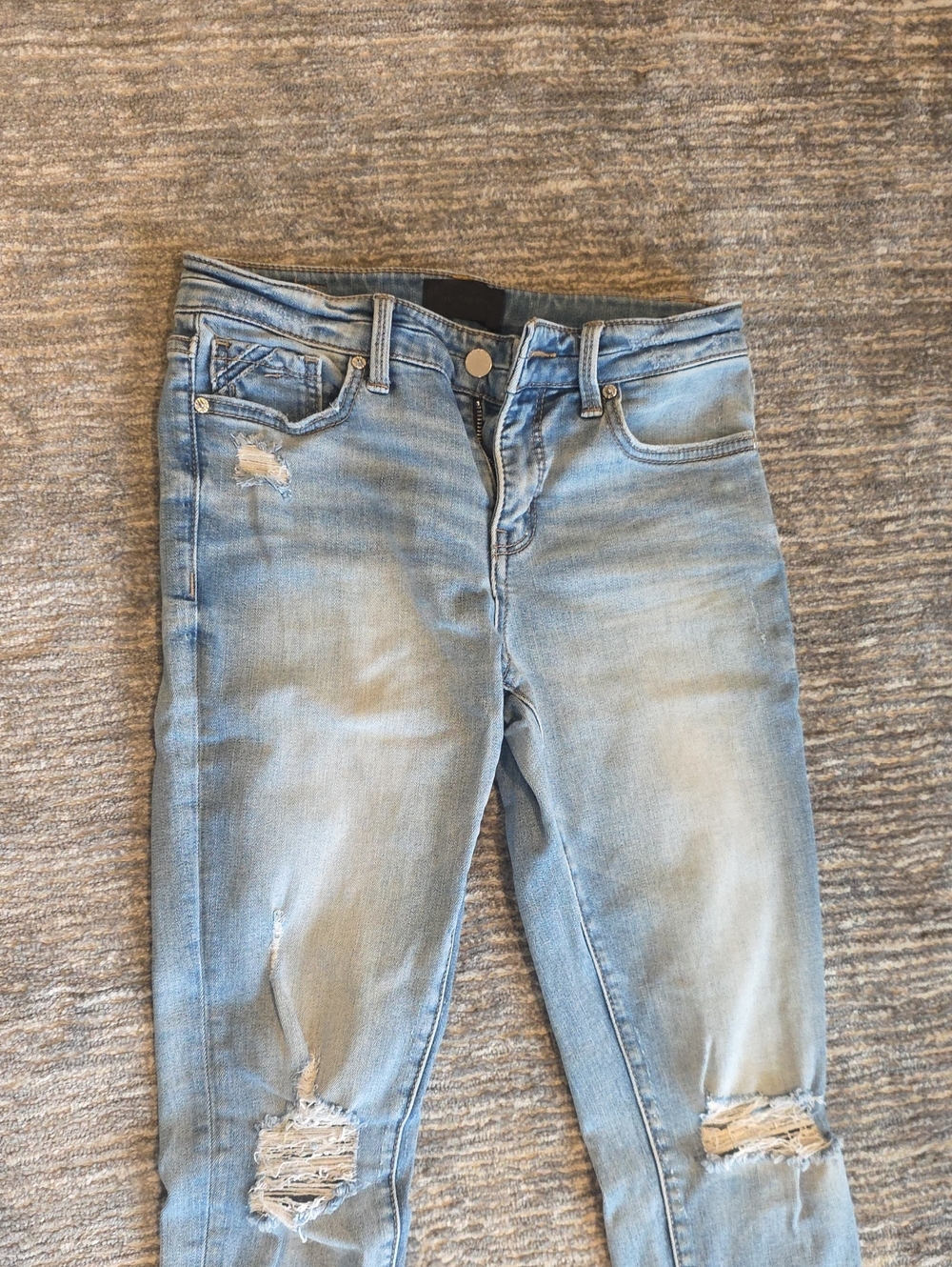 Buckle Light Blue Distressed Skinny Jeans